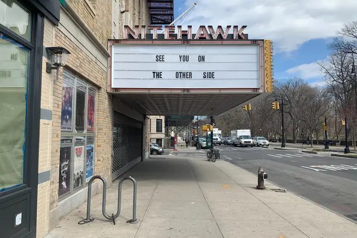 See you on the other side, a marquee reads